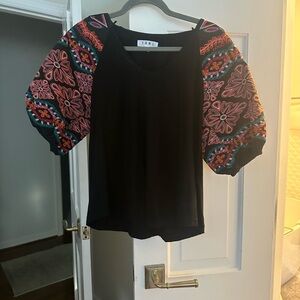 Too with smbroidered sleeves